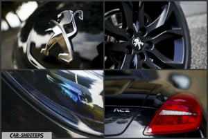 dettagli logo peugeot rcz thp 200 con i fari xenon