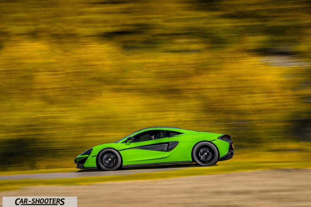 Mclaren 570S – side profile, green on a country road